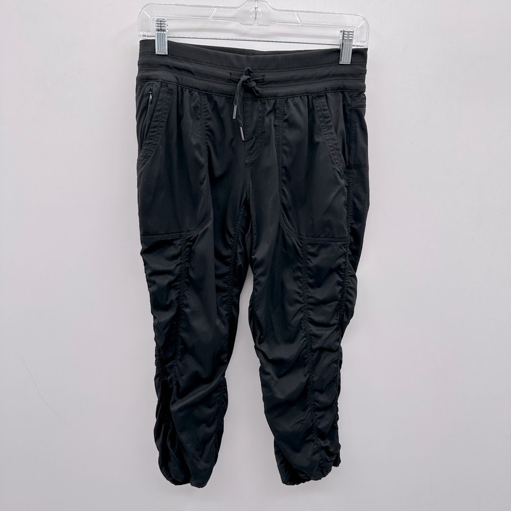 The North Face black elastic adjustable waist cinch leg casual woman pant. SP
